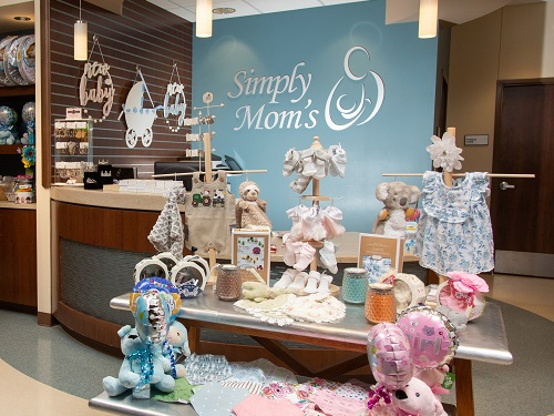 Items on a table at the Simply Mom's boutique at Baylor Scott & White Medical Center – McKinney