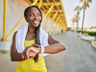 A woman out on a walk after learning how many steps to take a day to lose weight