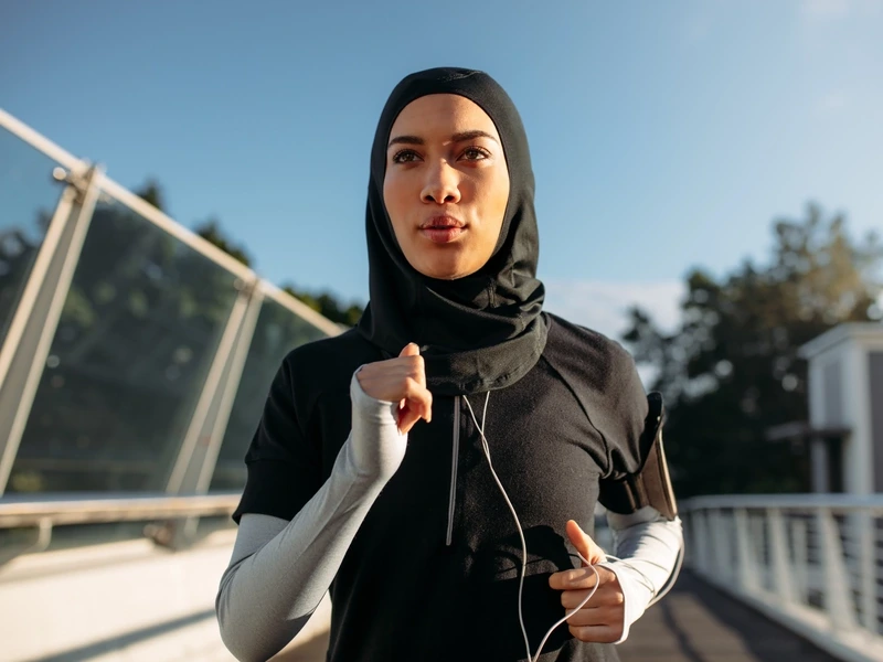 A woman out for a jog keeping her heart healthy