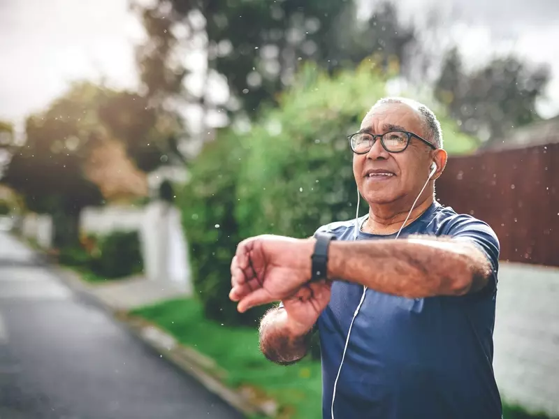 Active senior using a fitness tracker
