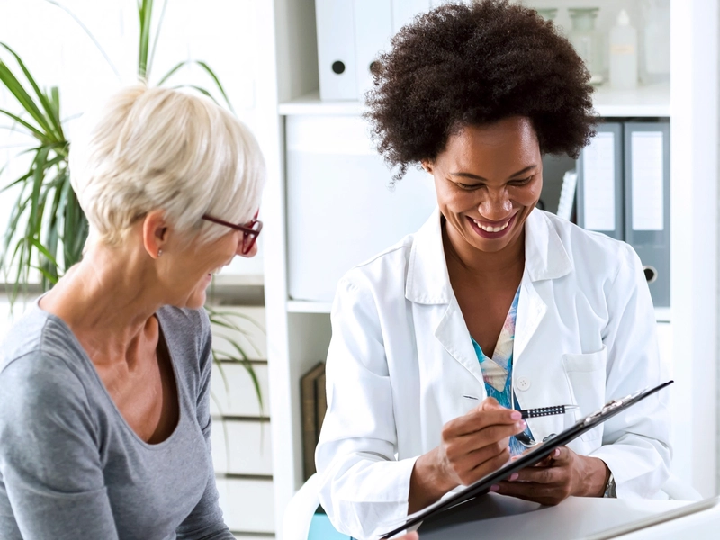Doctor speaking with a patient during a medical appointment