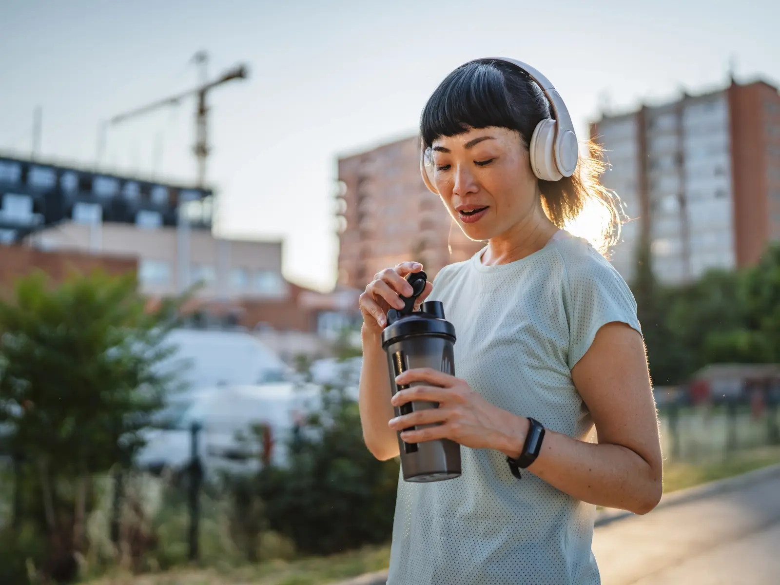A woman eats a protein-rich meal after asking a dietitian “How much protein do I need?