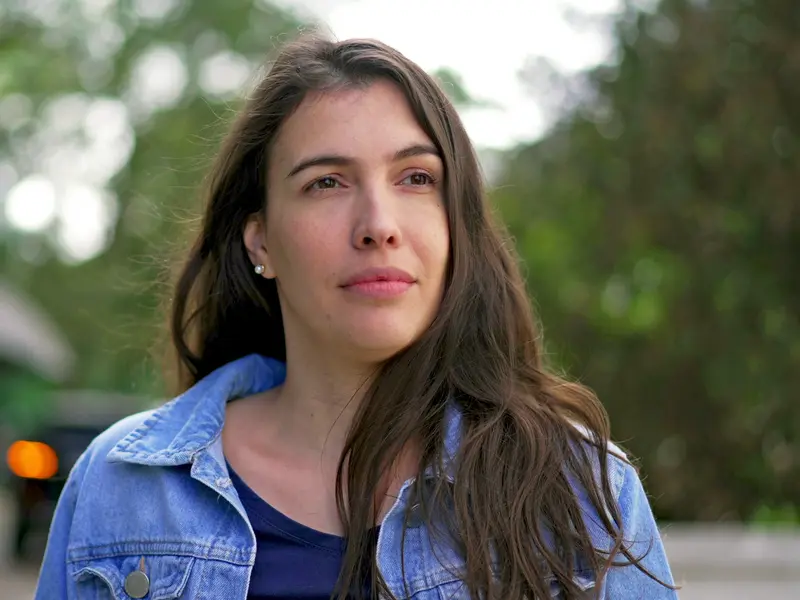 woman standing alone thinking about sexual health