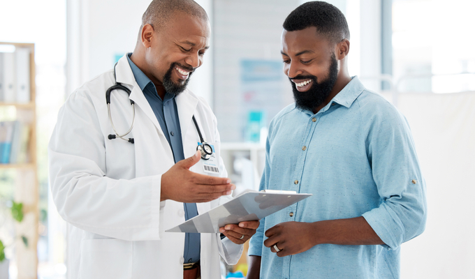 Research doctor talking to patient.