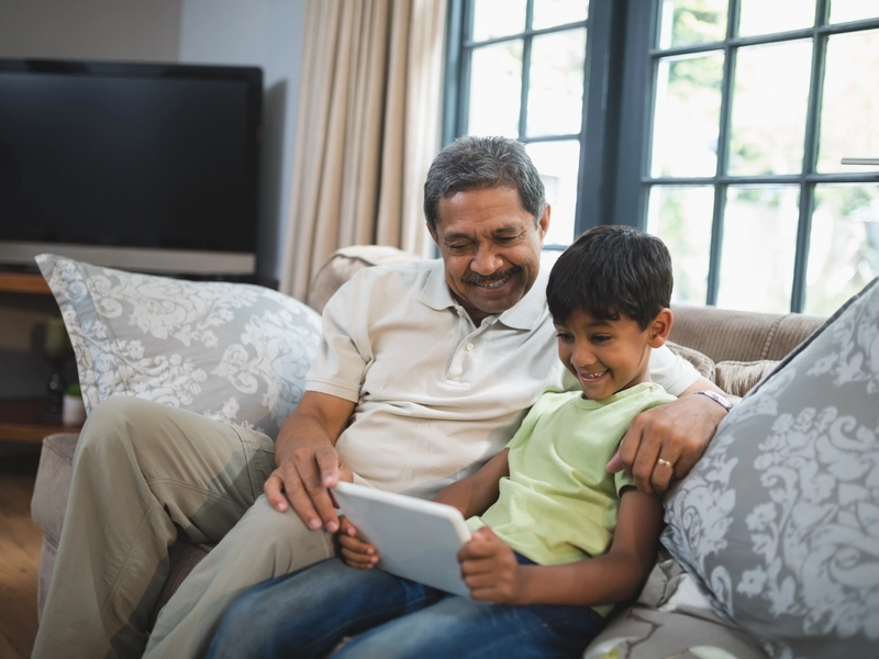 a father enjoying time with his son after getting his essential tremors under control