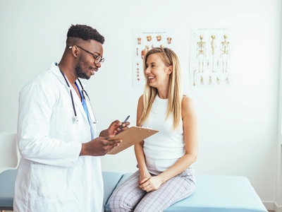 A female patient asking what is a primary care provider to her doctor