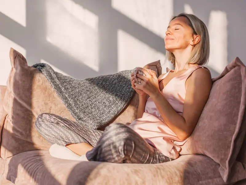 Bladder Pain Syndrome patient enjoying quiet time on the couch