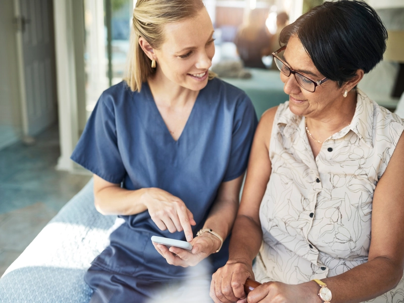 nurse navigator discussing cancer care with a patient