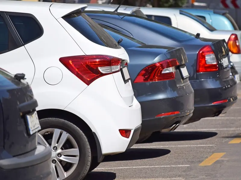 A row of cars parked at Grapevine Hospital through valet services