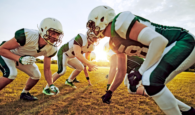 Football players lined up on the field