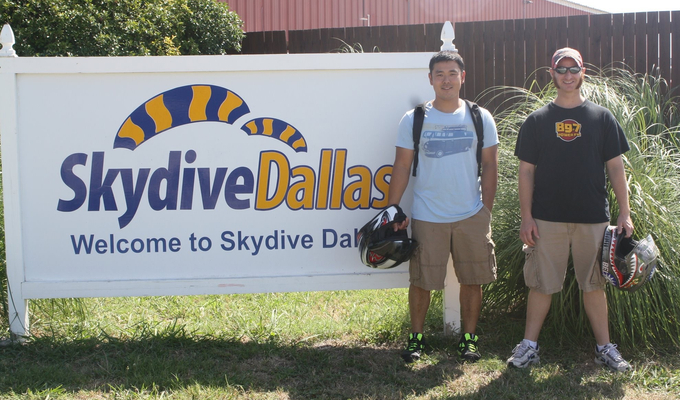 Yuki Tsutsumi and Stephen Mensch pose for a photo together outside of the Skydive Dallas training c