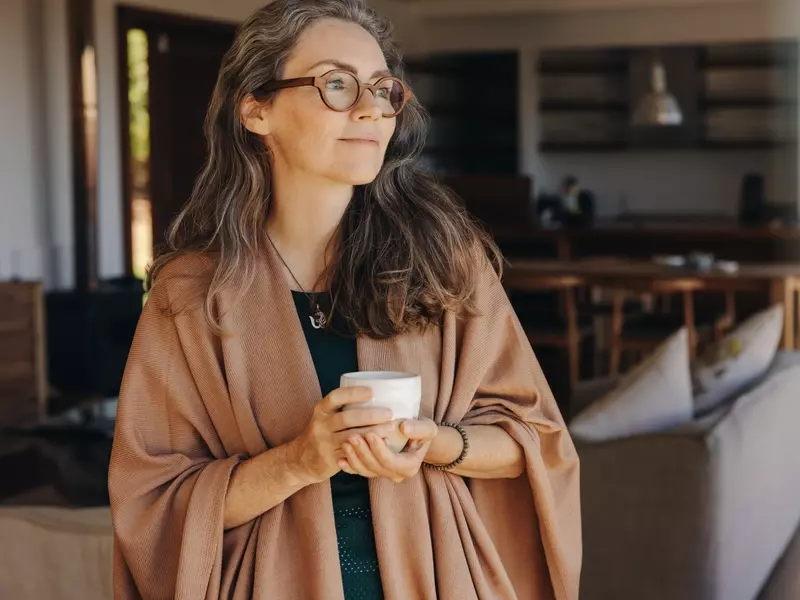 a dysphagia patient enjoying a cup of coffee