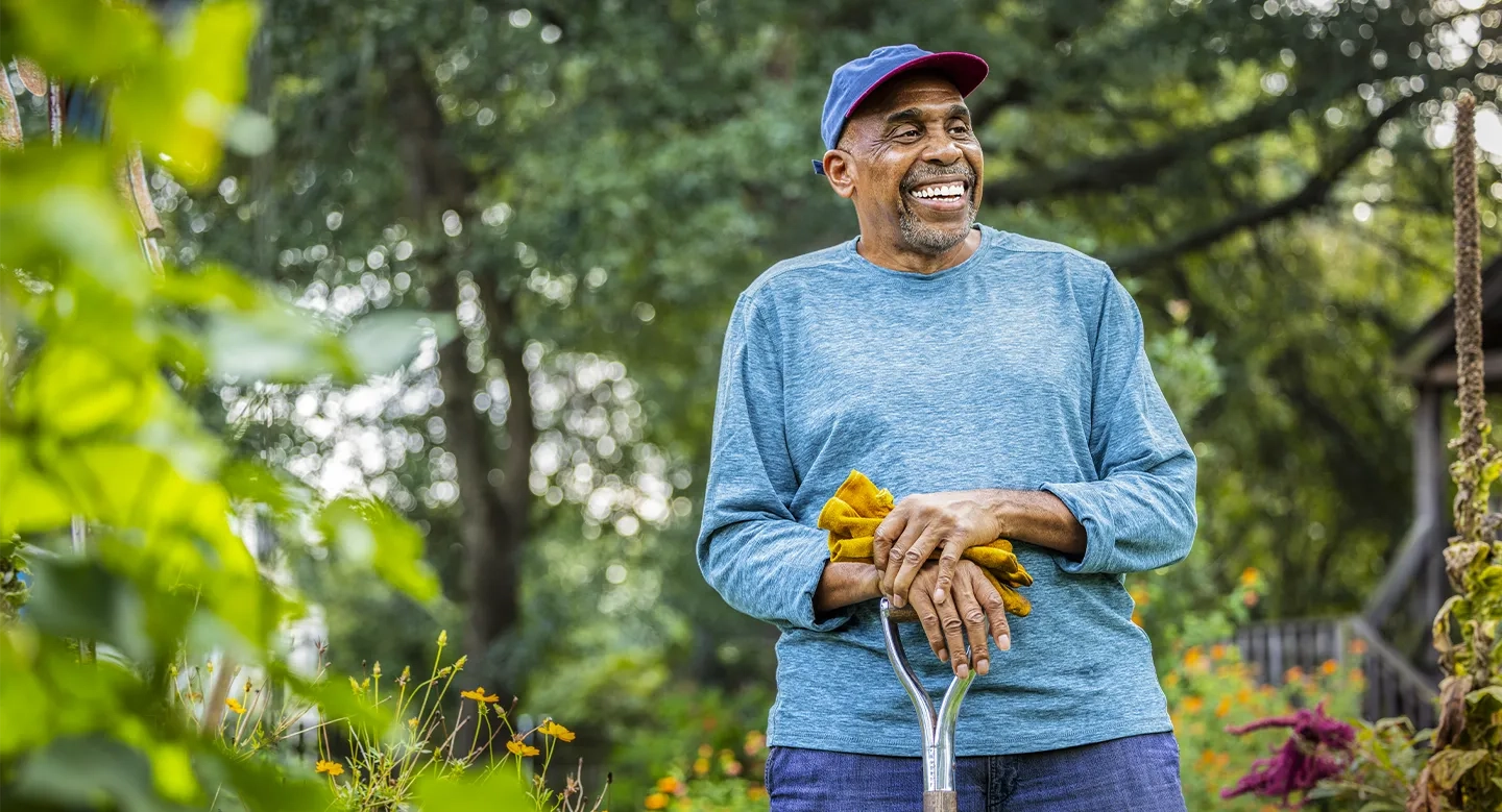 Elderly active man in his garden