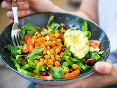 A healthy bowl of food full of vegetables inspired by the blue zone diet