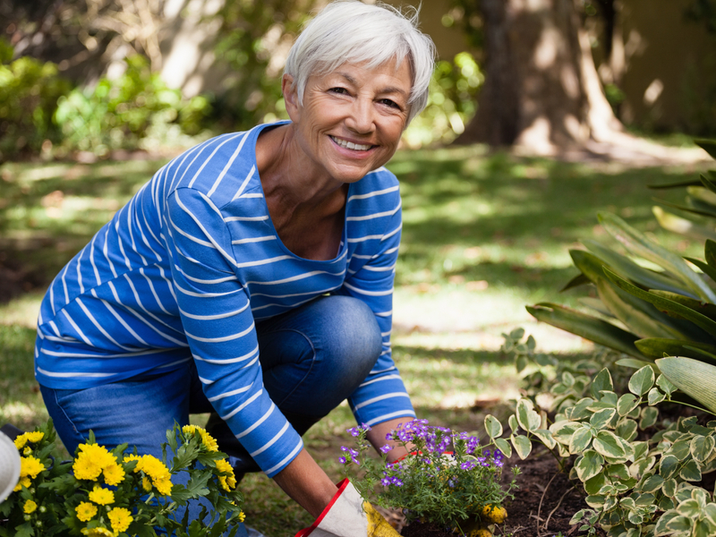 women outside in her garden after recovering from arthroscopy procedure