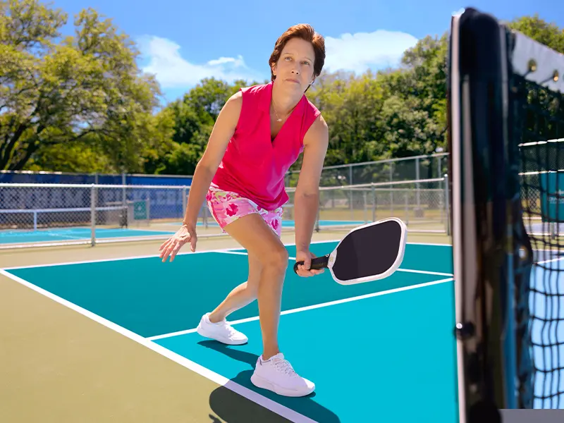 Woman playing pickleball