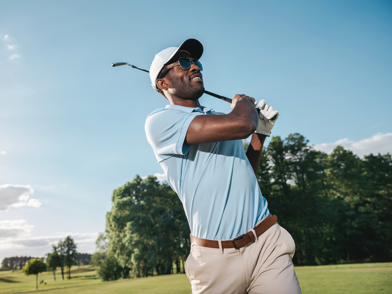 PRP patient outside enjoying a game of golf
