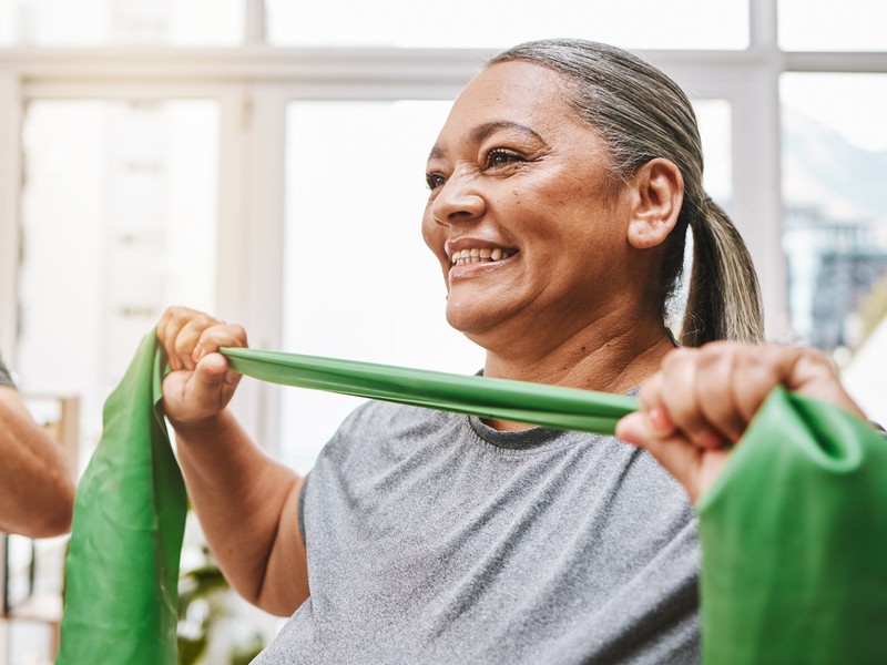 women practicing physical therapy excercises