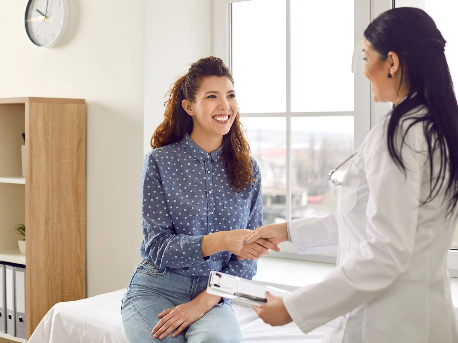  A younger woman sits and wonders how often do you need a Pap smear as part of her health routine a